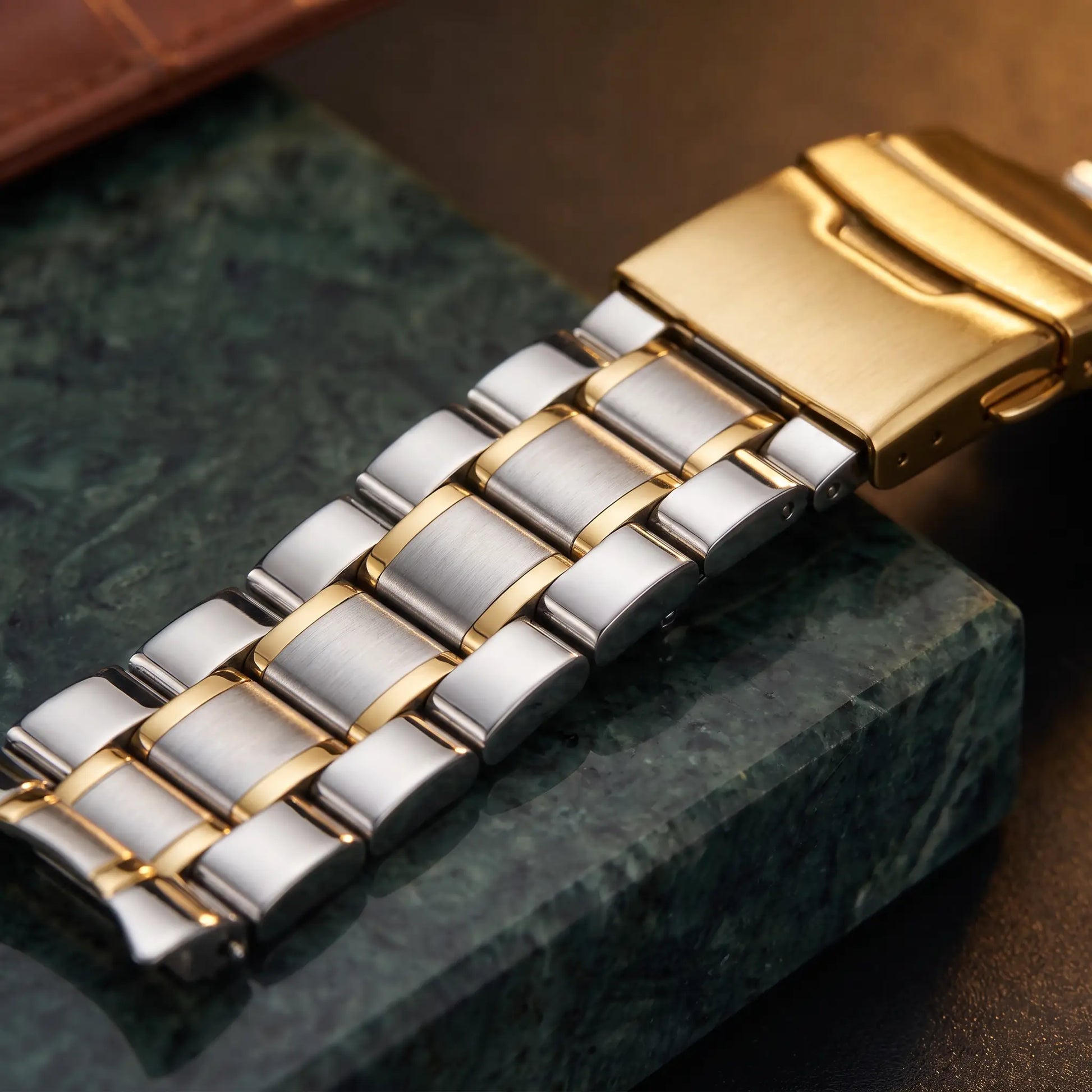Close up of the two tone steel band links and folding clasp on the Starry Dial Watch