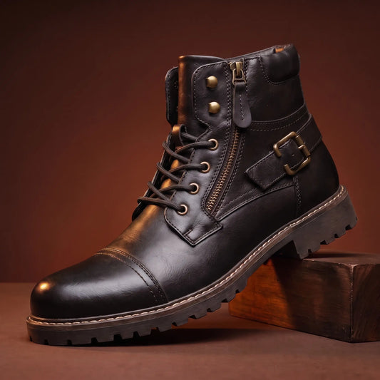 Strapped Biker Boots in black with a brass buckle strap and side zip