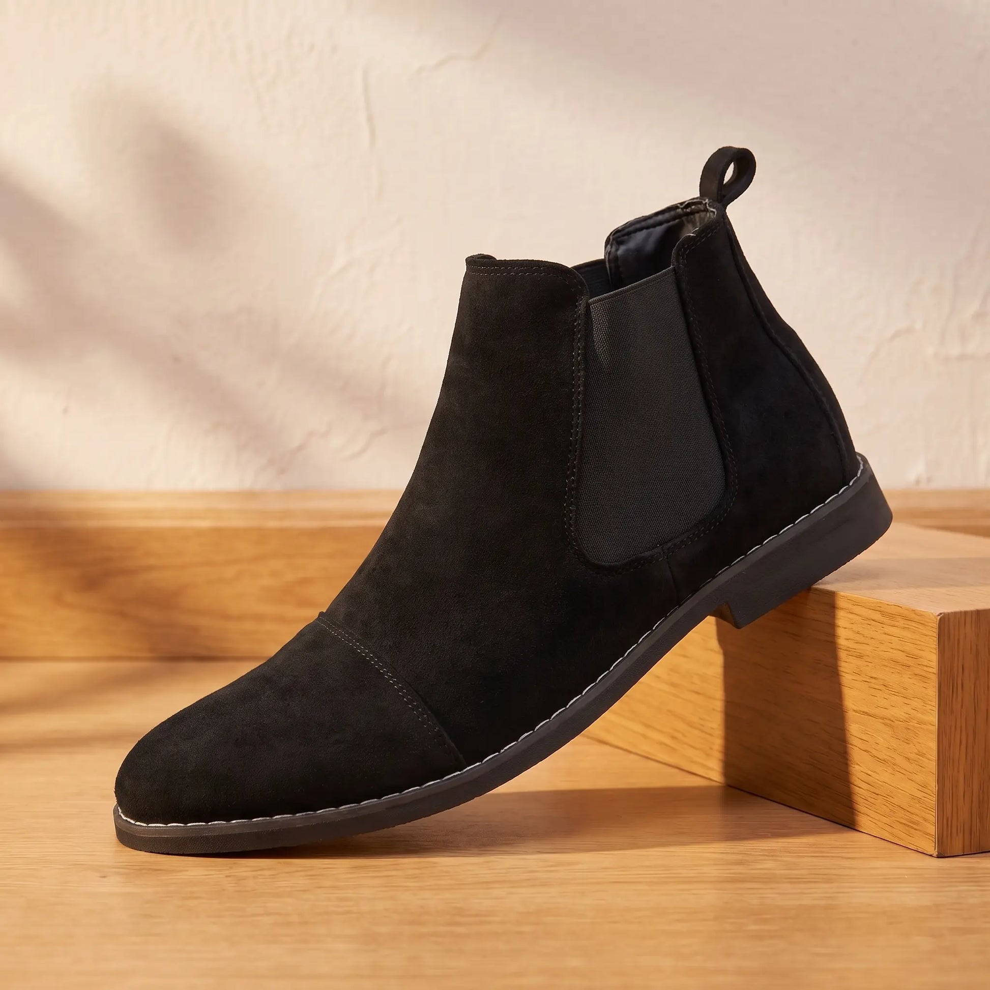 Stretch Panel Boots in black, a pointed toe slip-on Chelsea boot with an elastic side panel