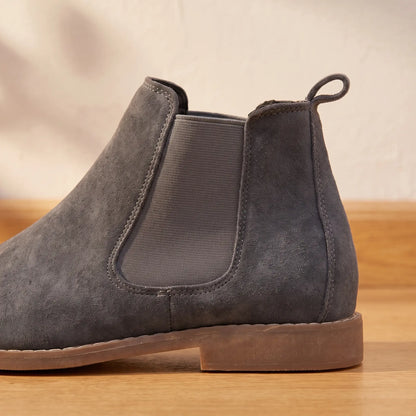 Close up of the elastic side panel and rear heel pull tab on the Stretch Panel Boots
