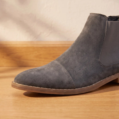Close up of the pointed toe, stitched welt and flat sole on the Stretch Panel Boots