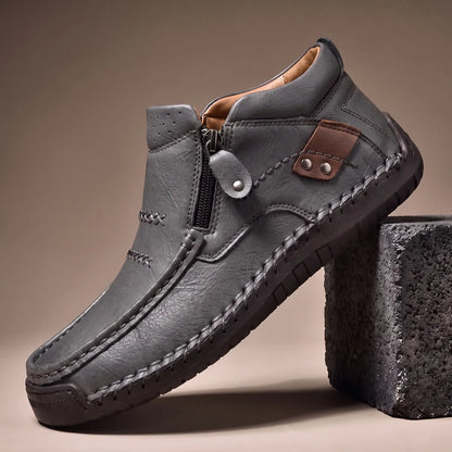Stud Strap Boots in gray leather with side zip