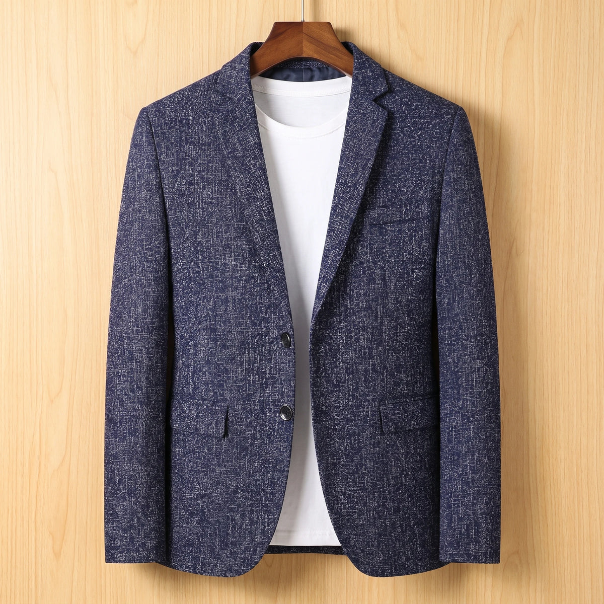 Navy tailored slim blazer on wooden hanger