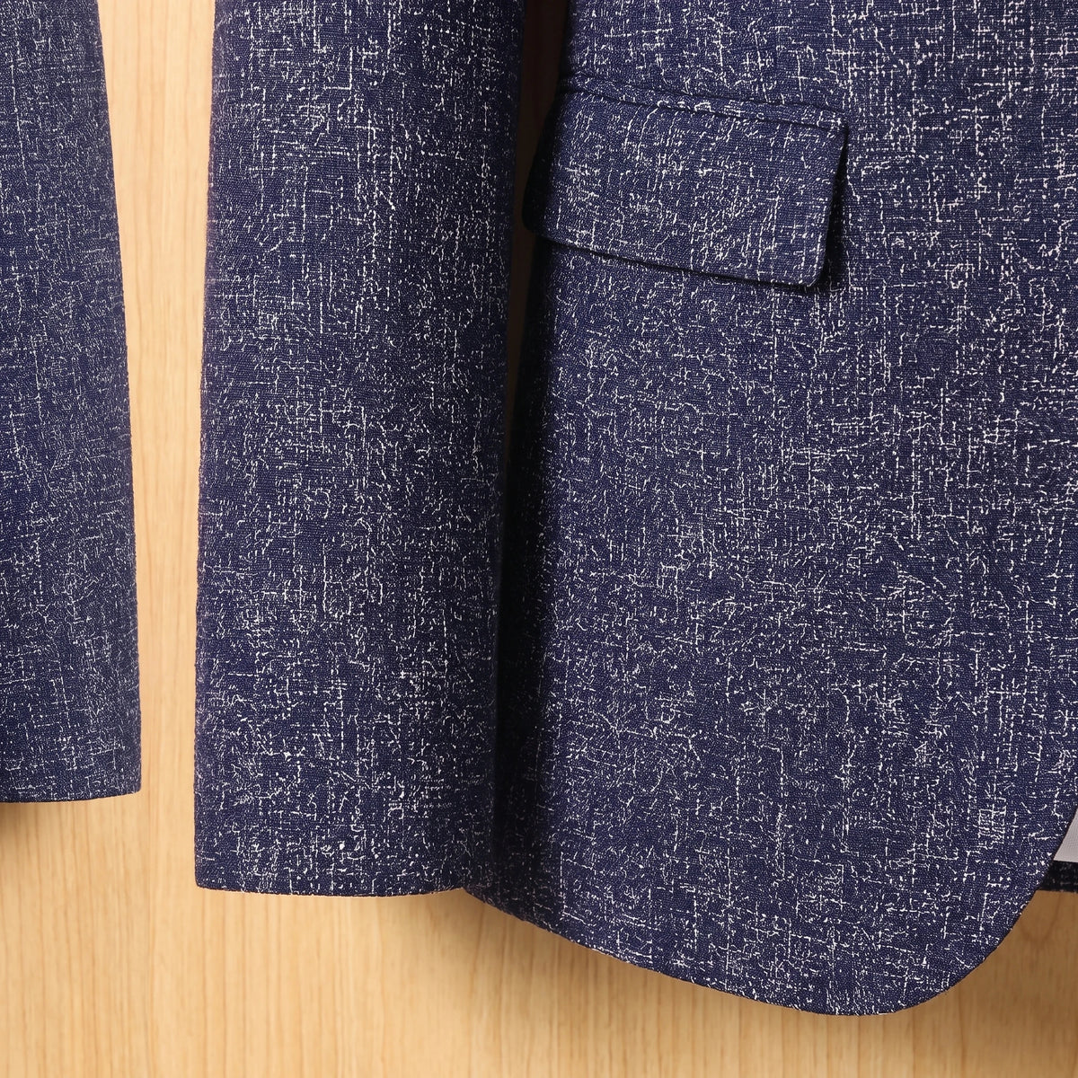 Tailored slim blazer sleeve and hem detail