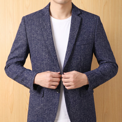 Man wearing tailored slim blazer, buttoning gesture