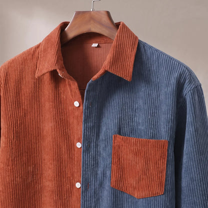 Close up of the collar, white button placket and contrast patch chest pocket on the rust and blue Two Tone Overshirt