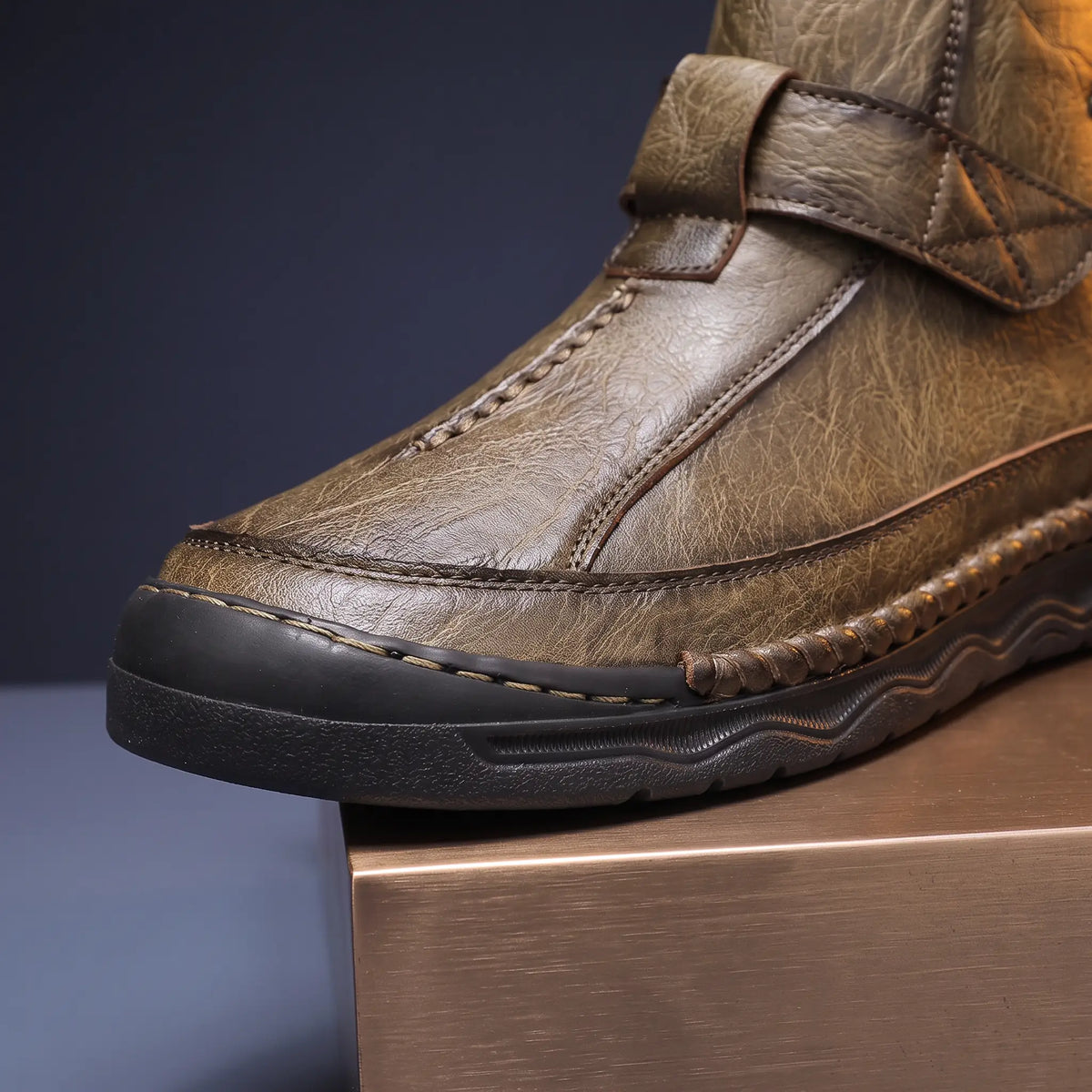Close up of the hand stitched welt and thick black wave sole on Wave Sole Shoes