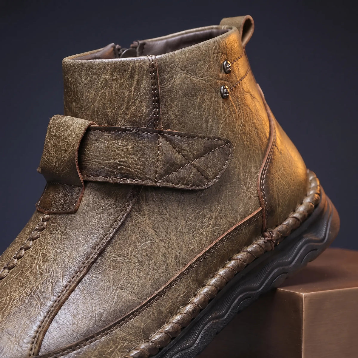 Close up of the wide instep strap, rivet studs and fold over collar on Wave Sole Shoes