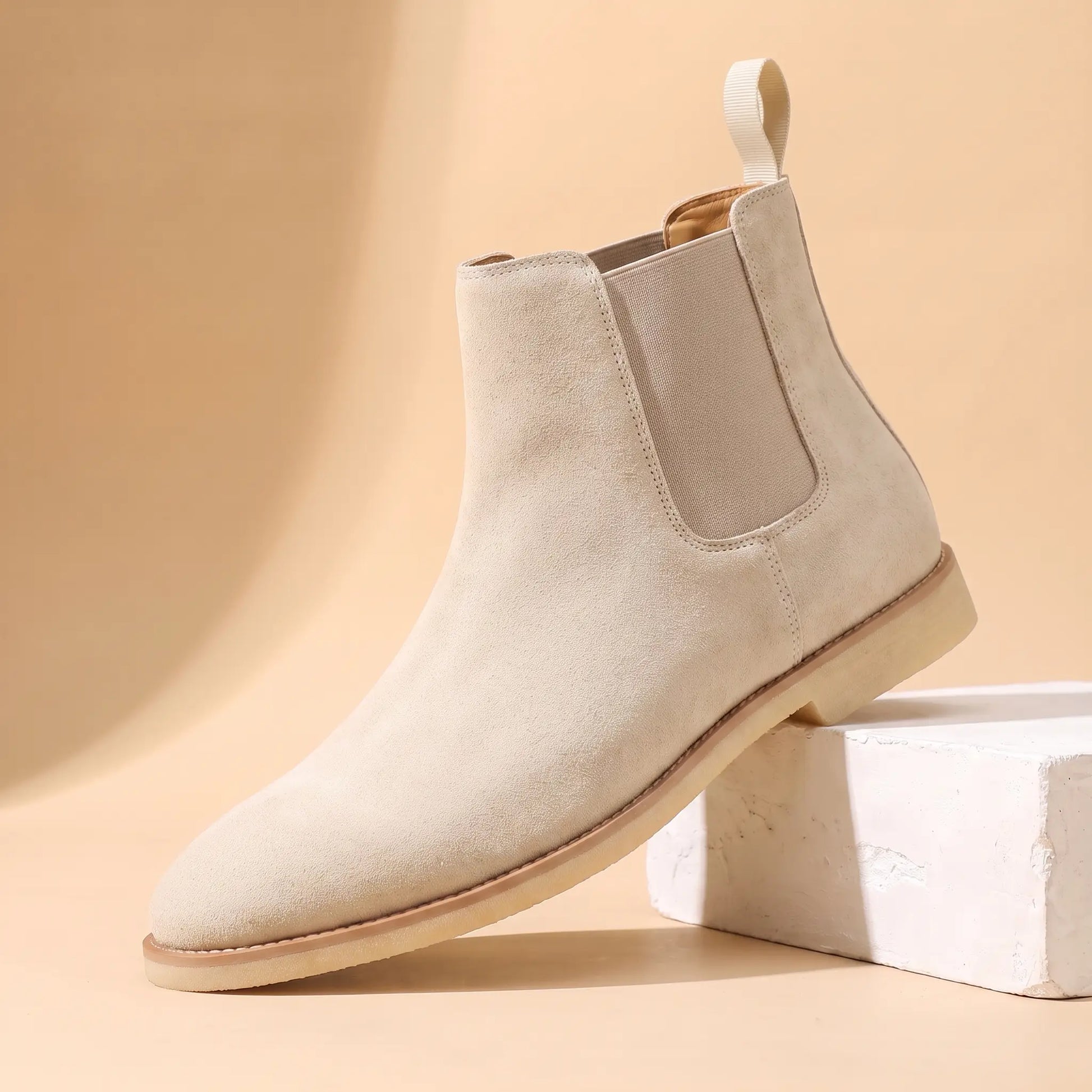 Webbing Tab Boots in cream, a leather Chelsea boot with a cream heel pull loop