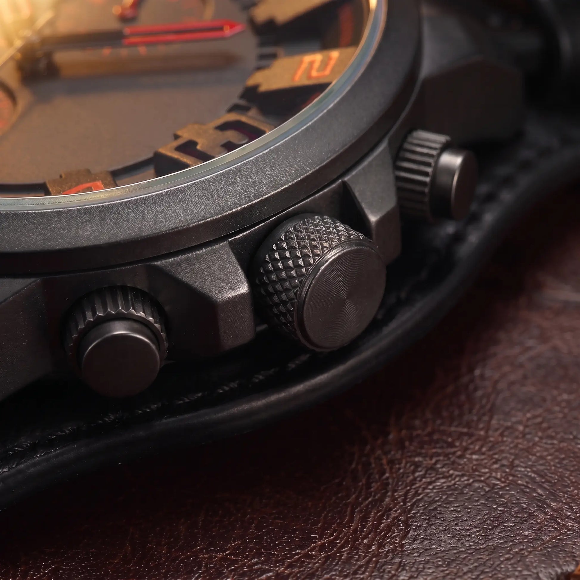 Close up of the ridged crown, guard and side buttons on the Wide Cuff Watch