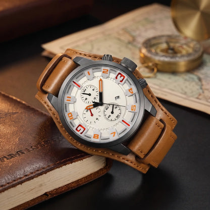 Wide Cuff Watch with cream dial, orange raised numbers and a wide tan leather cuff strap