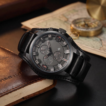 Wide Cuff Watch with grey dial, pale raised numbers and a wide black leather cuff strap